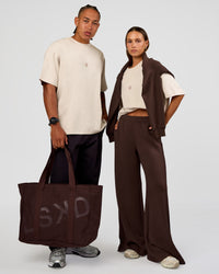 Duo wearing CF Unisex Oversized Heavyweight FLXCotton Tee - Clay-CF X LSKD Sport | Model:Malebo | Size:M | Model:Brylee | Size:XS | Thumbnail Index: 0