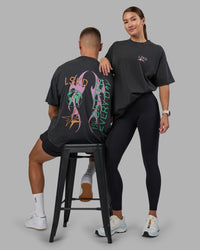 Duo wearing Digital World Heavyweight Oversized Tee - Washed Black | Model:Both | Size:Duo | Thumbnail Index: 0