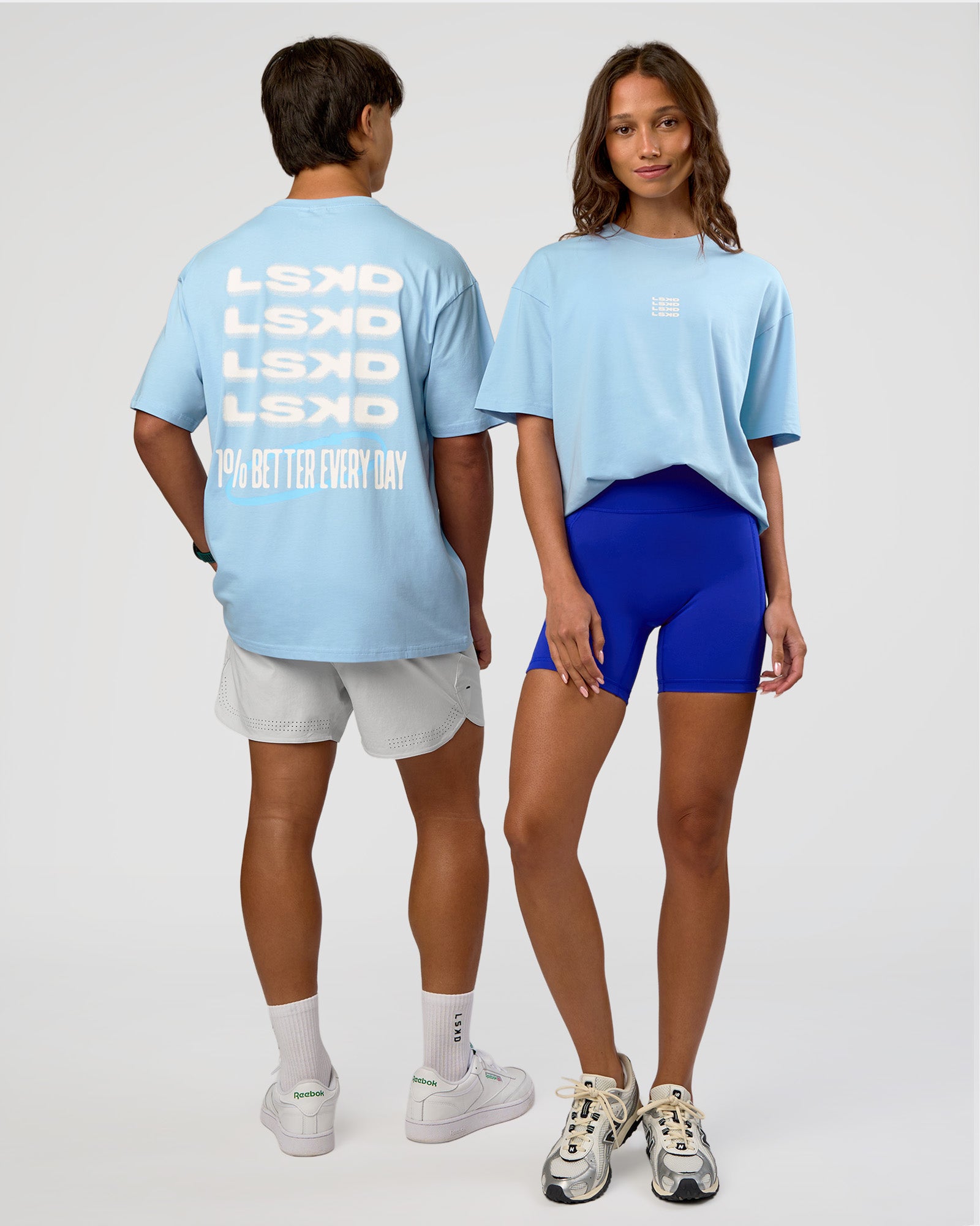 Duo wearing Everyday Elevation FLXCotton Oversized Tee - Open Air-Off White | Model:Both | Size:Duo