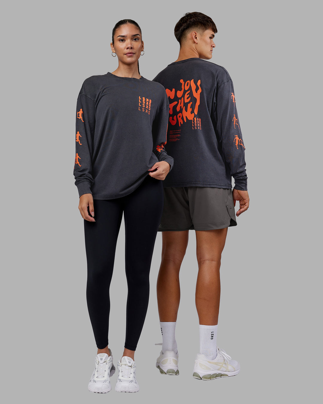 Duo wearing Inferno Journey FLXCotton Oversized Long Sleeve Tee - Washed Black-Ultra Orange | Model:Both | Size:Duo - view 15