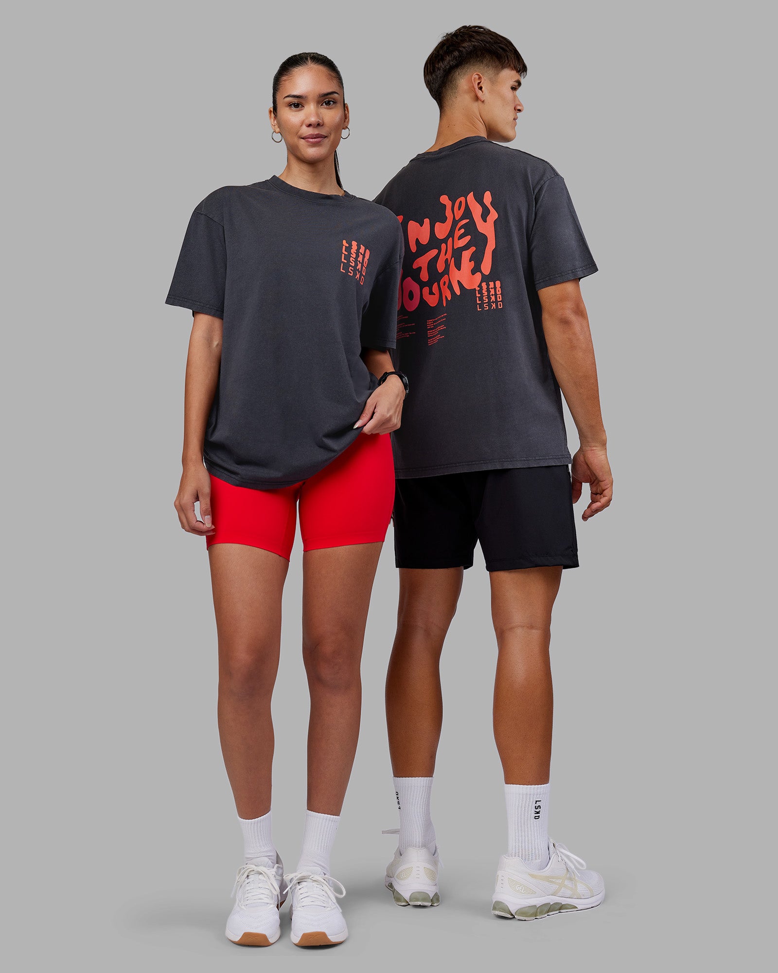 Duo wearing Inferno Journey FLXCotton Oversized Tee - Black Washed-Ultra Orange | Model:Both | Size:Duo