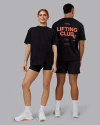 Duo wearing Lifting Club FLXCotton Tee Oversize - Black-Ultra Orange | Model:Both | Size:Duo | Thumbnail Index: 0