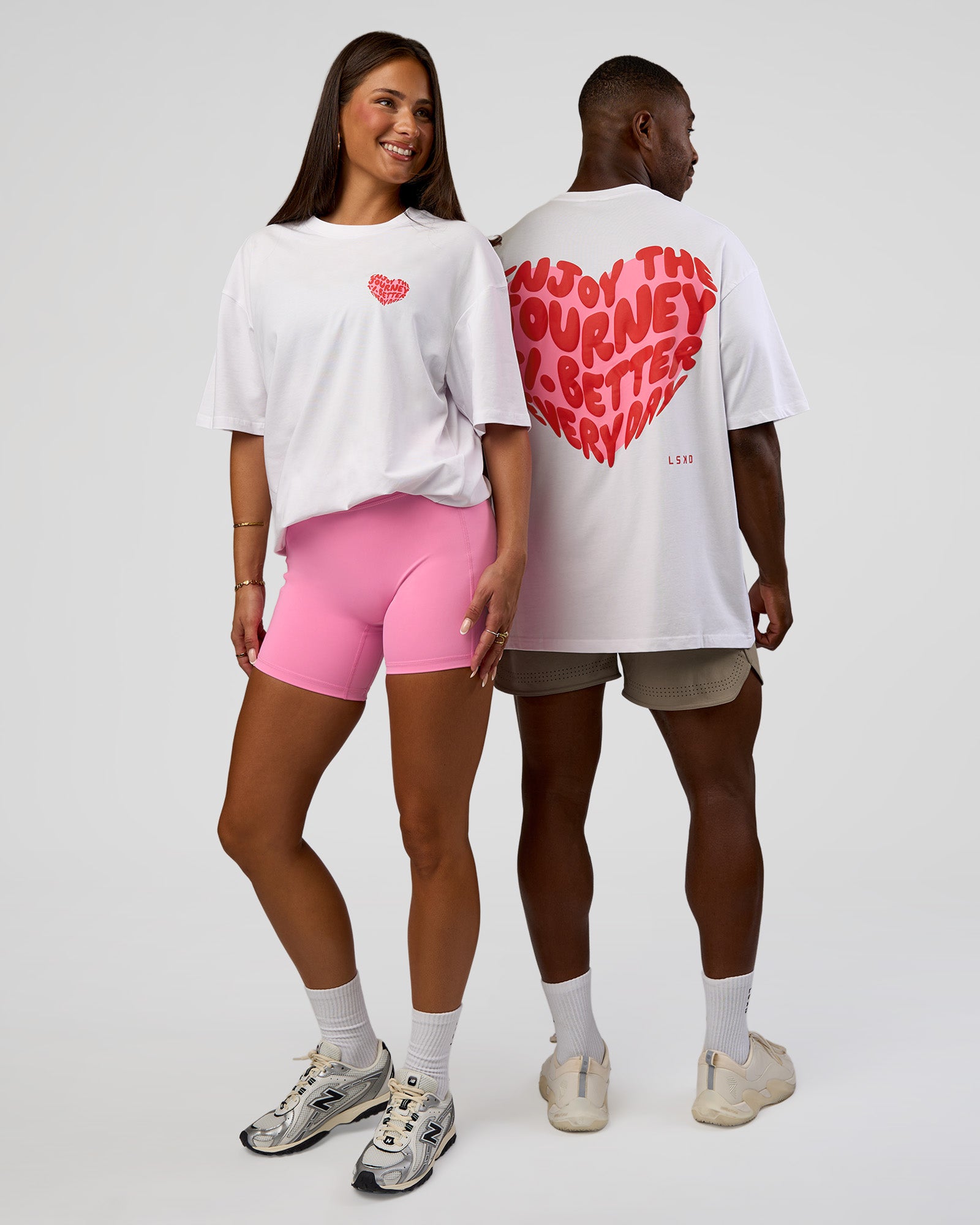 Duo wearing Love the Journey FLXCotton Oversized Tee - White-Candy Pink | Model:Both | Size:Duo