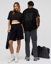 Duo wearing Memory in Motion Heavyweight Oversized Tee - Black Washed | Model:Both | Size:Duo | Thumbnail Index: 0