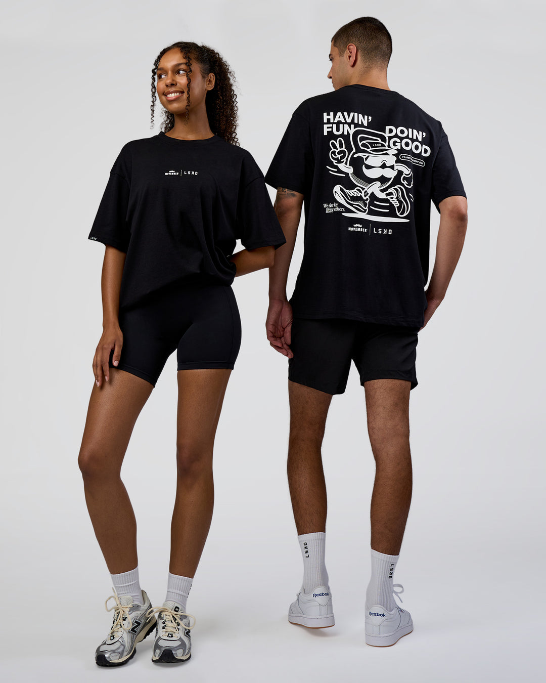 Duo wearing Movember 2025 FLXCotton Oversize Tee - Black | Model:Both | Size:Duo - view 1