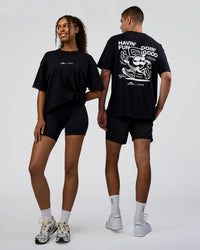Duo wearing Movember 2025 FLXCotton Oversize Tee - Black | Model:Both | Size:Duo | Thumbnail Index: 0