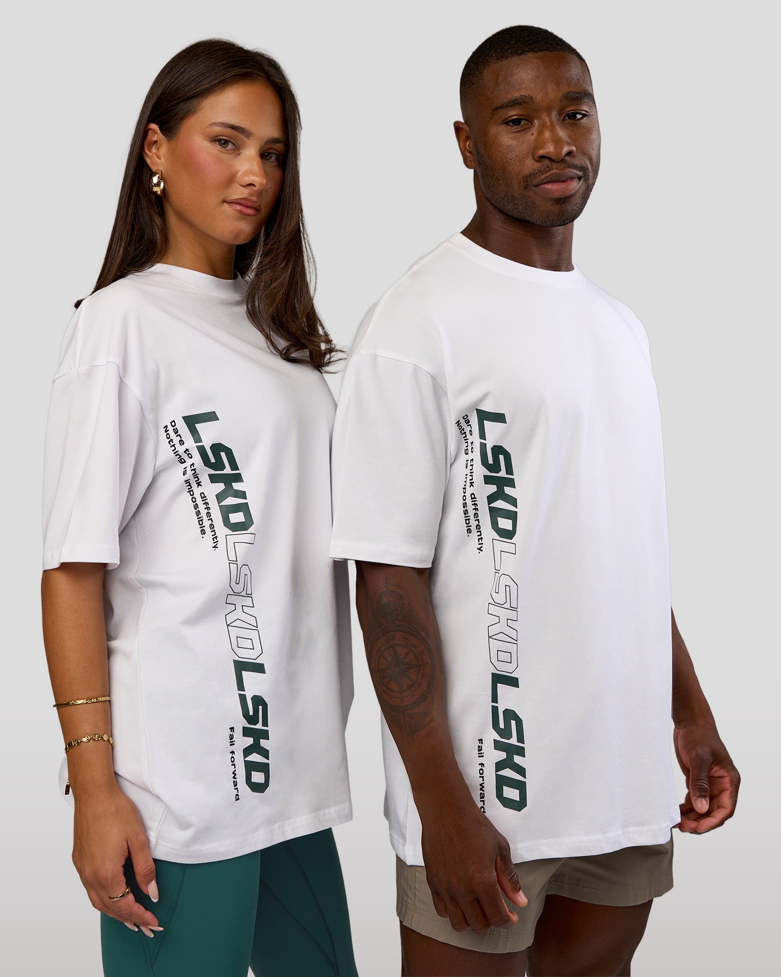 Duo wearing Nothing Is Impossible FLXCotton Oversized Tee - White-Vital Green | Model:Both | Size:Duo