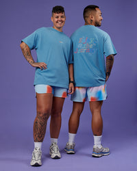 Duo wearing Our Journey Heavyweight Oversized Tee - Azure Blue-Rainbow | Model:Both | Size:Duo | Thumbnail Index: 0