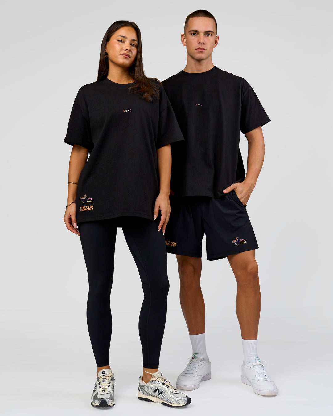 Duo wearing Pride Sticker Boxy Tee - Black | Model:Bianca | Size:S | Model:Albert | Size:M - view 19