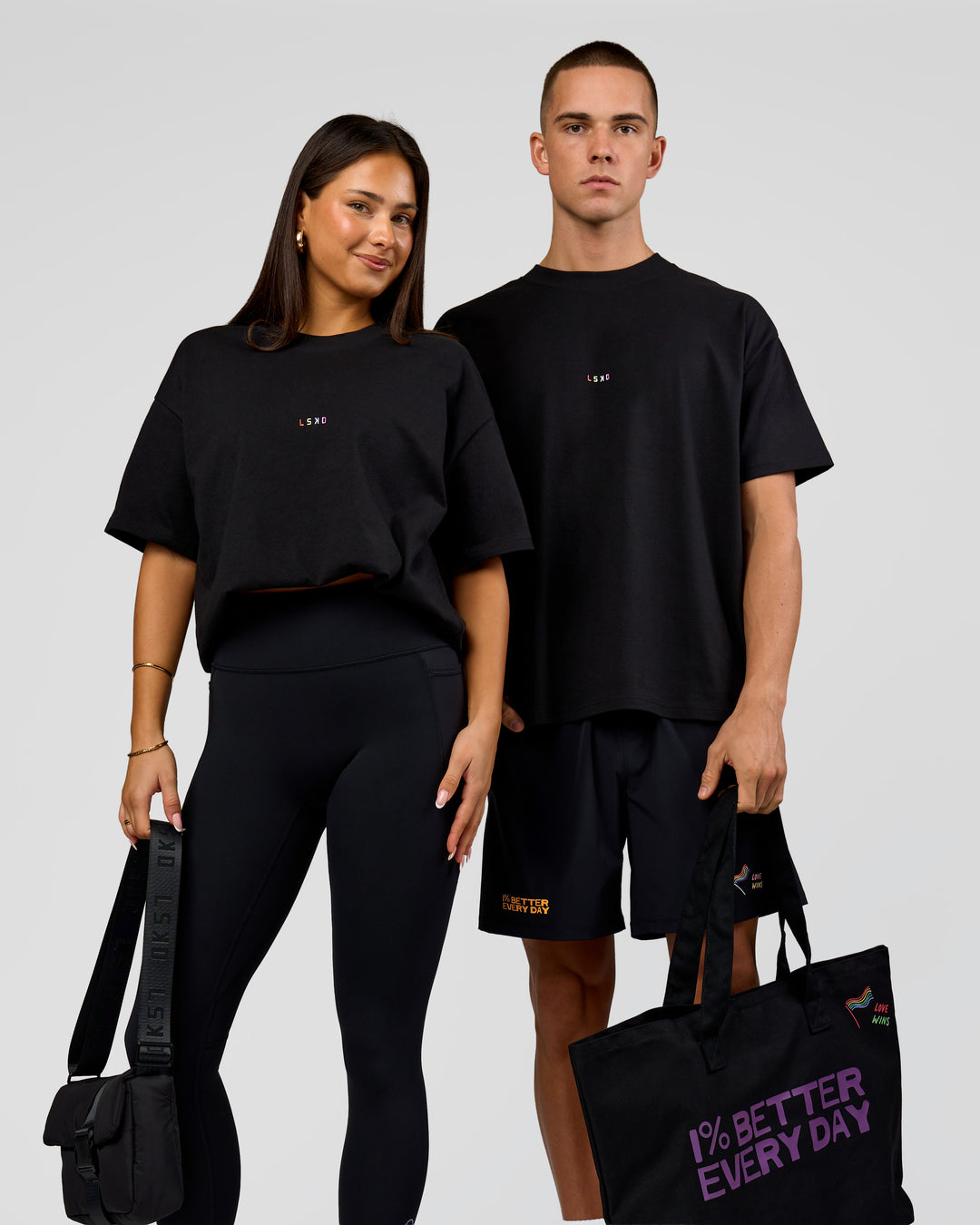 Duo wearing Pride Sticker Boxy Tee - Black | Model:Bianca | Size:S | Model:Albert | Size:M - view 20