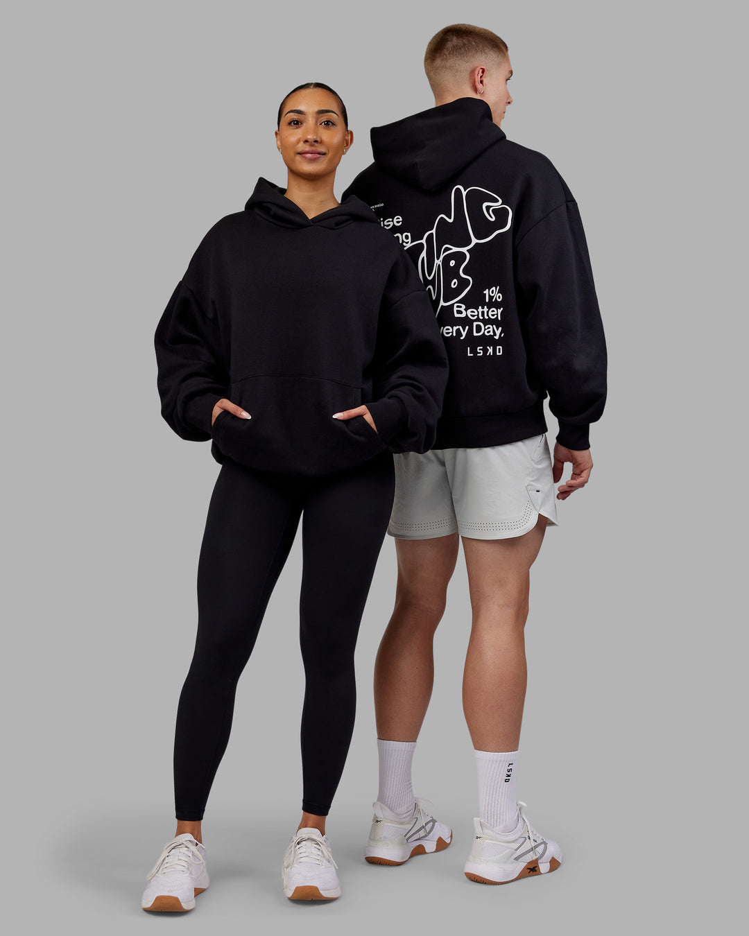 Duo wearing Rise &amp; Lift Hoodie Oversized - Black-White | Model:Both | Size:Duo - view 1