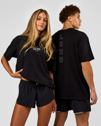 Duo wearing Run Club Script FLXCotton Oversized Tee - Black-Alloy | Model:Both | Size:Duo | Thumbnail Index: 0
