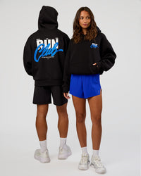Duo wearing Run Club Script Oversized Hoodie - Black-Palace Blue | Model:Both | Size:Duo | Thumbnail Index: 1