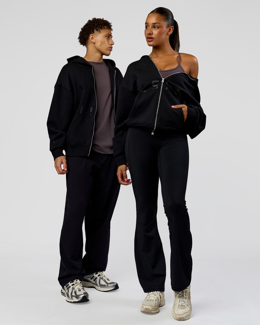 Duo wearing Shadow Mode Oversized Zip Through Hoodie - Black | Model:Both | Size:Duo - view 1