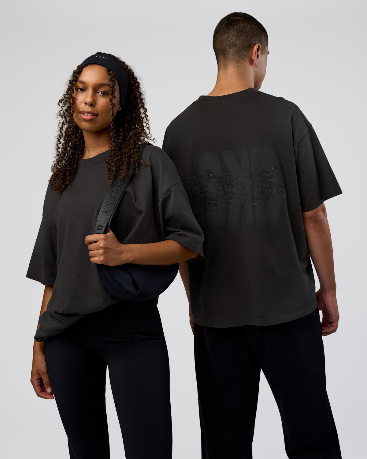 Duo wearing Spray Heavyweight Unisex Oversized Tee - Charcoal Washed | Model:Both | Size:Duo