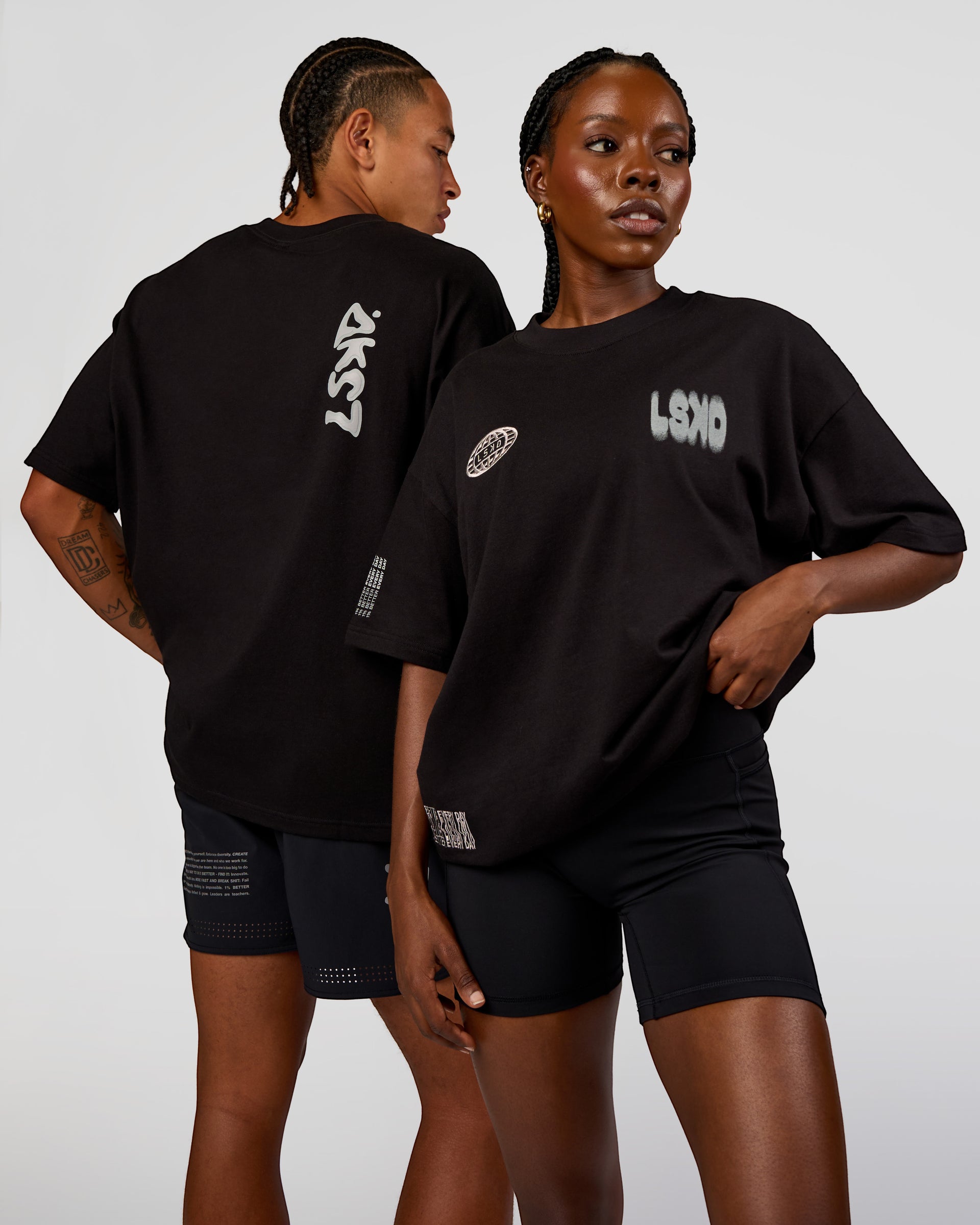Duo wearing Static Grit Heavyweight Oversized Tee - Black-Alloy | Model:Both | Size:Duo