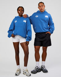 Duo wearing Static Grit Unisex Boxy Hoodie - Palace Blue-White | Model:Both | Size:Duo | Thumbnail Index: 1