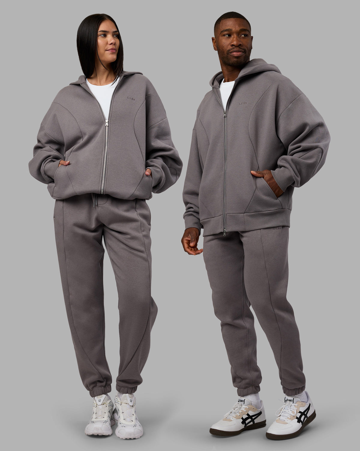 Duo wearing Stream Oversized Panel Zip Hoodie - Storm Front and Track Pant | Model:Both | Size:Duo