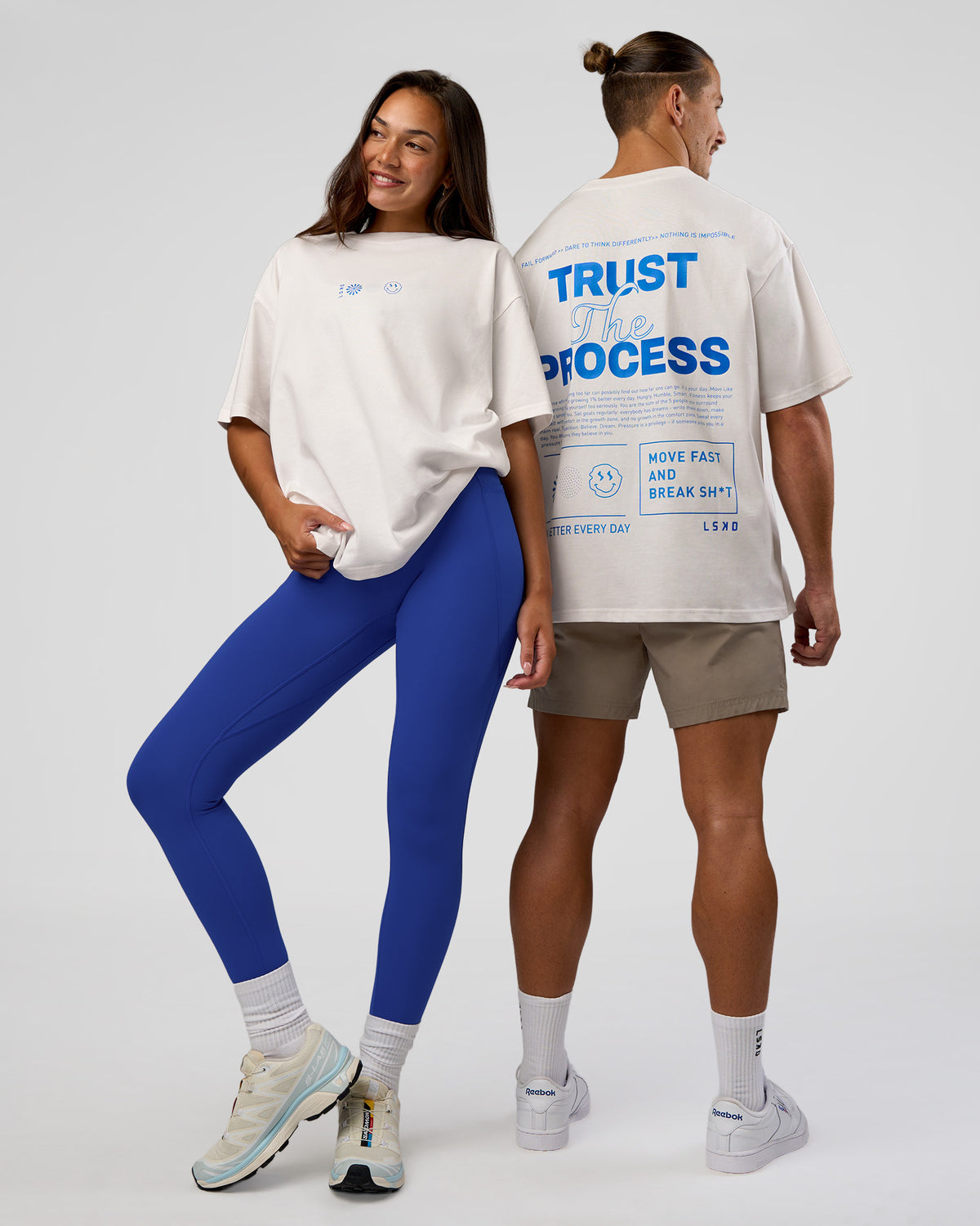 Duo wearing Trust The Process Heavyweight Unisex Oversized Tee - Off White-Electric Indigo | Model:Both | Size:Duo