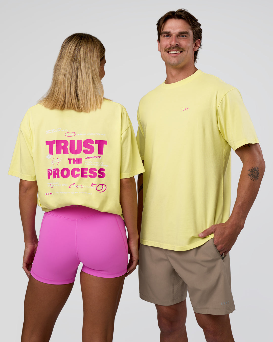 Duo wearing Unfit Club FLXCotton Oversized Tee - Yellow Fizz Washed-Ultra Fuchsia | Model:Both | Size:Duo - view 2