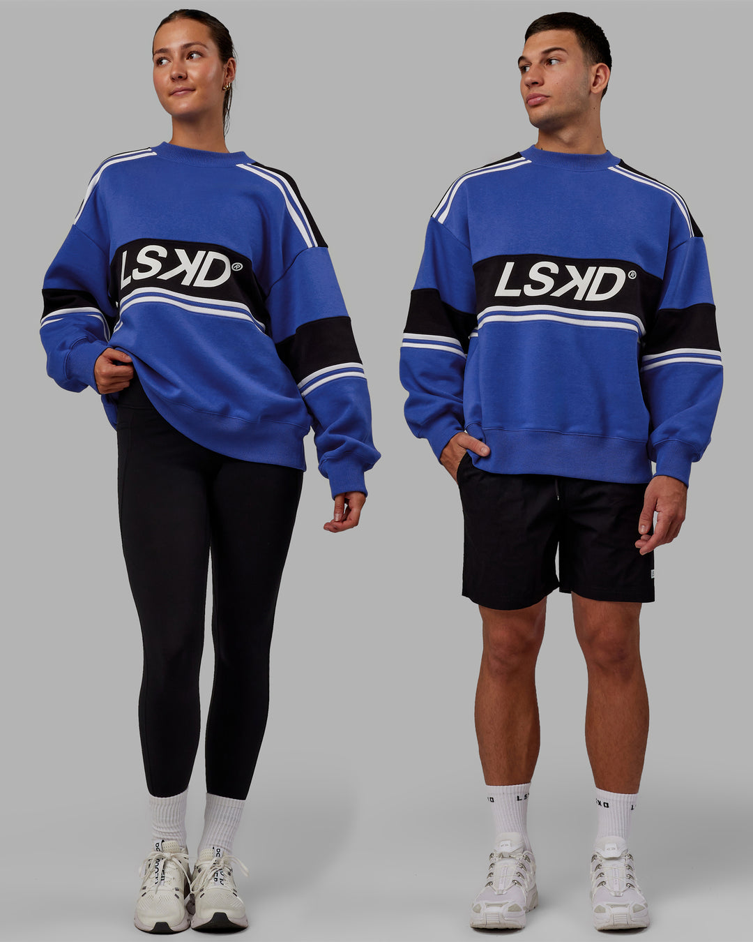 Duo wearing Unisex A-Team Sweater Oversize - Power Cobalt-Black - view 1