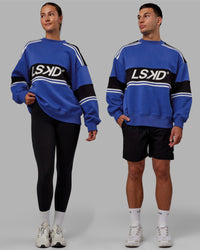 Duo wearing Unisex A-Team Sweater Oversize - Power Cobalt-Black | Thumbnail Index: 0