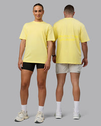 Duo wearing Unisex Enjoy the Journey Value Series FLXCotton Tee Oversize - Pale Yellow-Sundress | Thumbnail Index: 0
