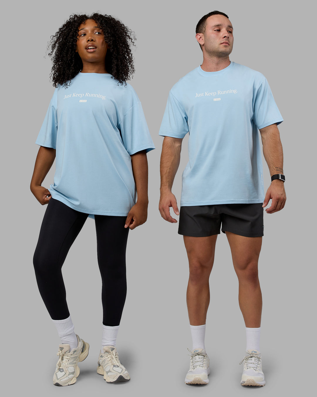 Duo wearing Unisex Just Keep Running FLXCotton Tee Oversize - Glacial Blue-Off White - view 1