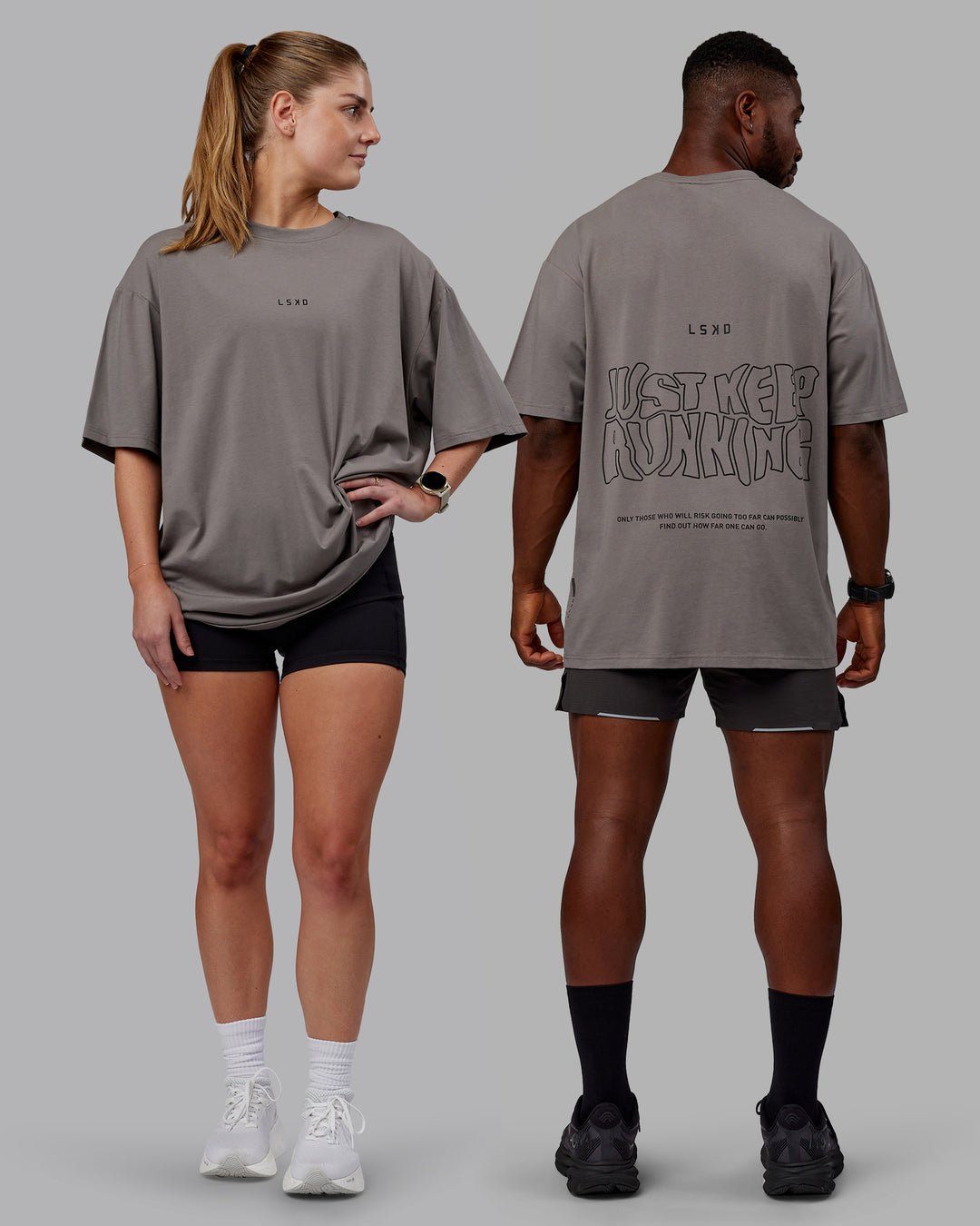 Duo wearing Unisex Leg It FLXCotton Tee Oversize - Storm Front-Black - view 1