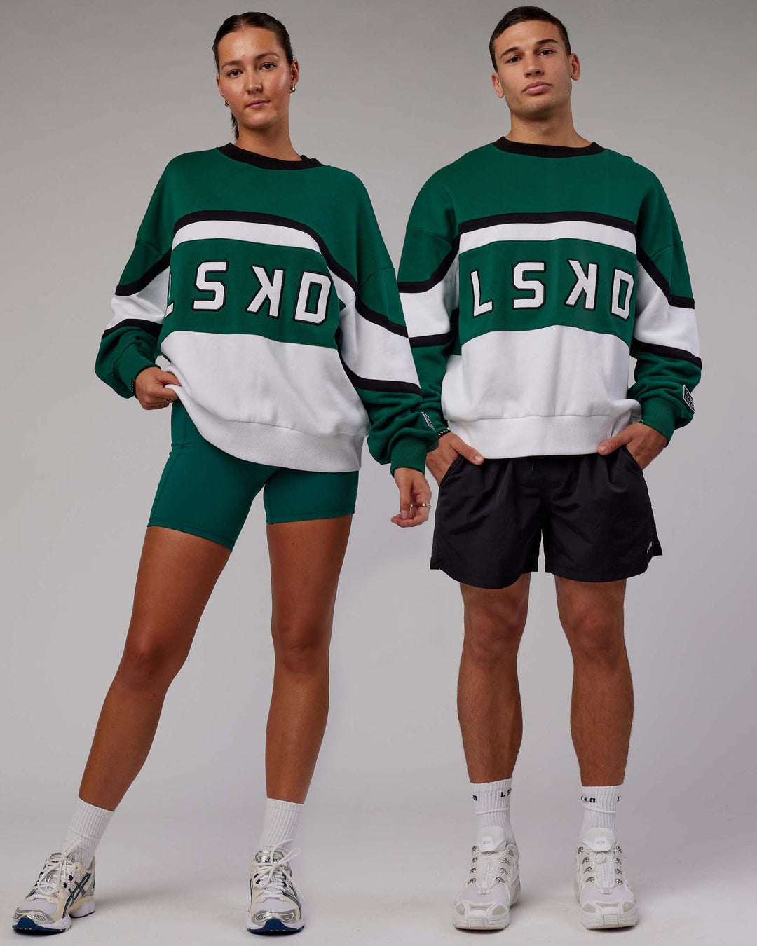 Duo wearing Unisex PrimeTime Sweater Oversize - Malachite-White - view 1