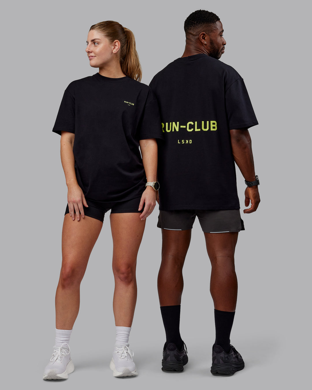 Duo wearing Unisex RUN CLUB FLXCotton Tee Oversize - Black-Volt - view 7