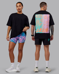 Duo wearing Unisex So Cal 24 FLXCotton Tee Oversize - Black-Beacon Orange | Thumbnail Index: 0