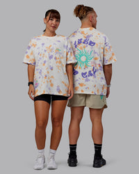Duo wearing Unisex Washed Huntington 24 Heavyweight Tee Oversize - Tie Dye Tangerine-Dahlia Purple | Thumbnail Index: 0