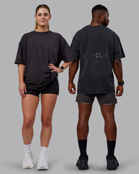 Duo wearing Unisex Washed RUN CLUB FLXCotton Tee Oversize - Black-Black | Thumbnail Index: 0