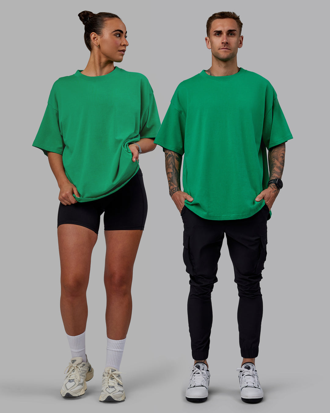 Duo wearing Unisex We Rise Heavyweight Tee Oversize - Impact Green-White - view 2