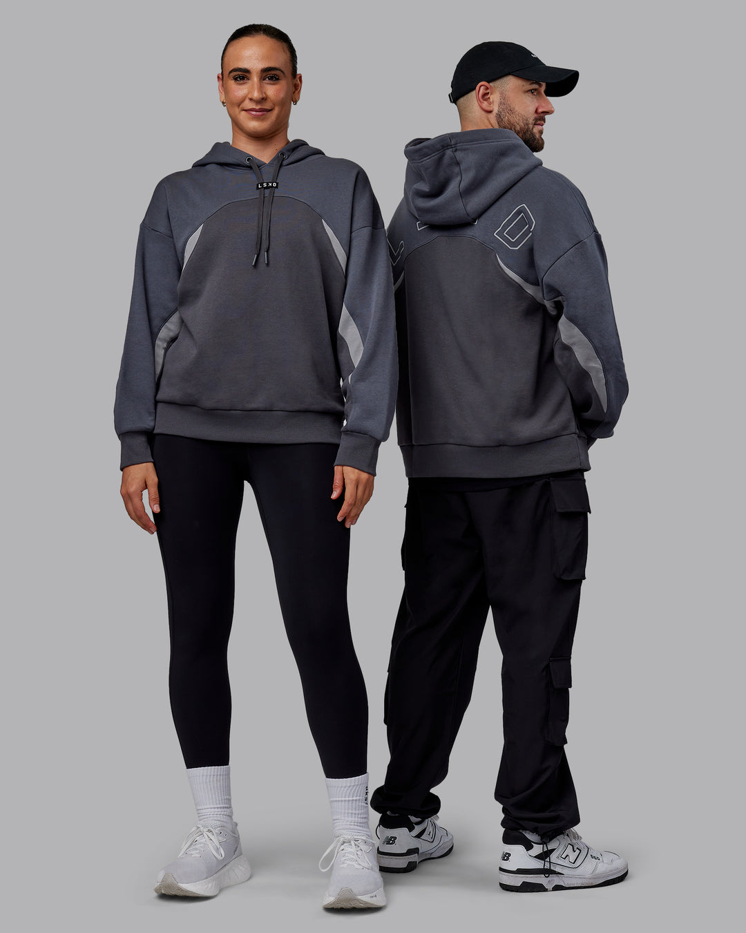 Duo wearing Unisex Y2K Concept Panel Hoodie - Asphalt-Turbulance - view 1
