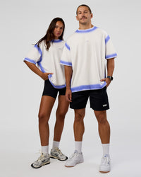Duo wearing Urban Blur Heavyweight Unisex Oversized Tee - Off White-Power Cobalt | Model:Both | Size:Duo | Thumbnail Index: 0