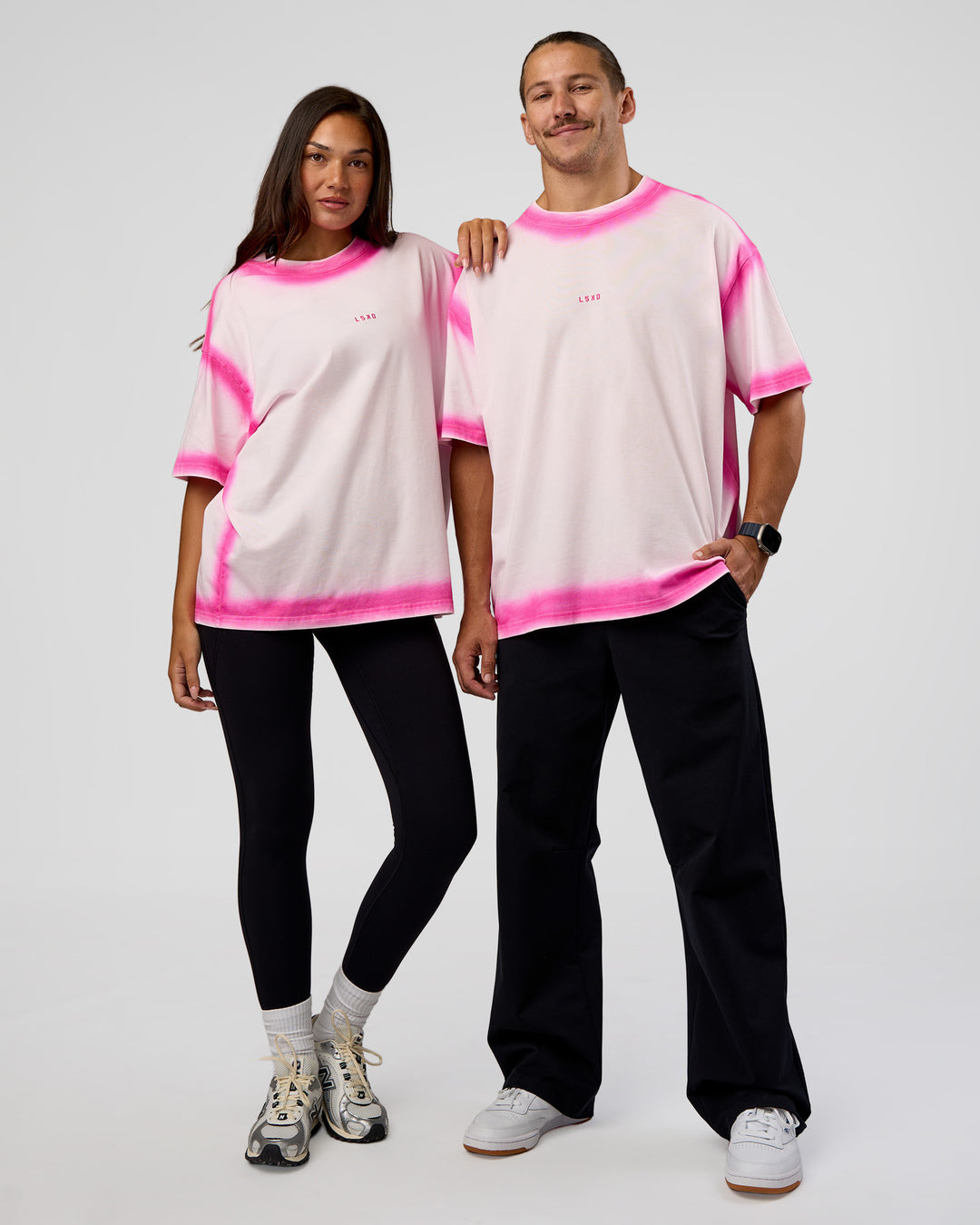 Duo wearing Urban Blur Heavyweight Unisex Oversized Tee - Off White-Ultra Pink | Model:Both | Size:Duo - view 1