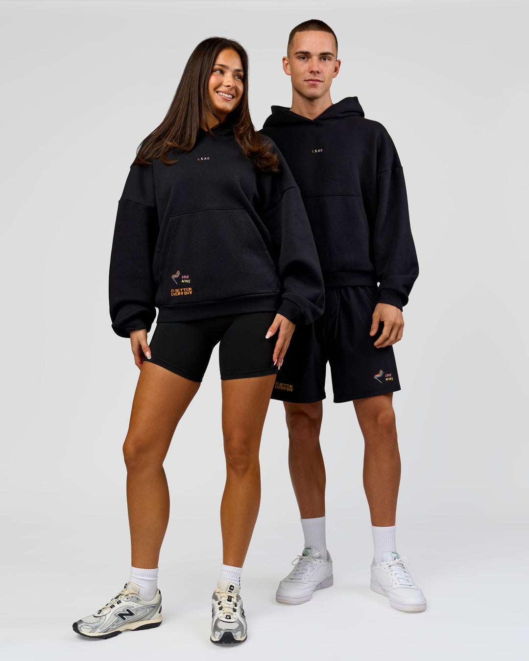 Duo wearing Pride Sticker Boxy Hoodie - Black | Model:Bianca | Size:XS | Model:Albert | Size:M - view 10