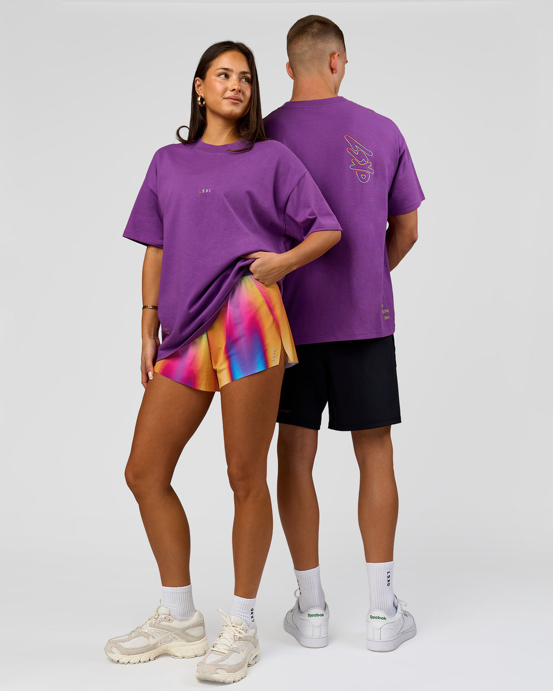 Duo wearing Pride Sticker Boxy Tee - Fresh Purple | Model:Bianca | Size:XS | Model:Albert | Size:M - view 1