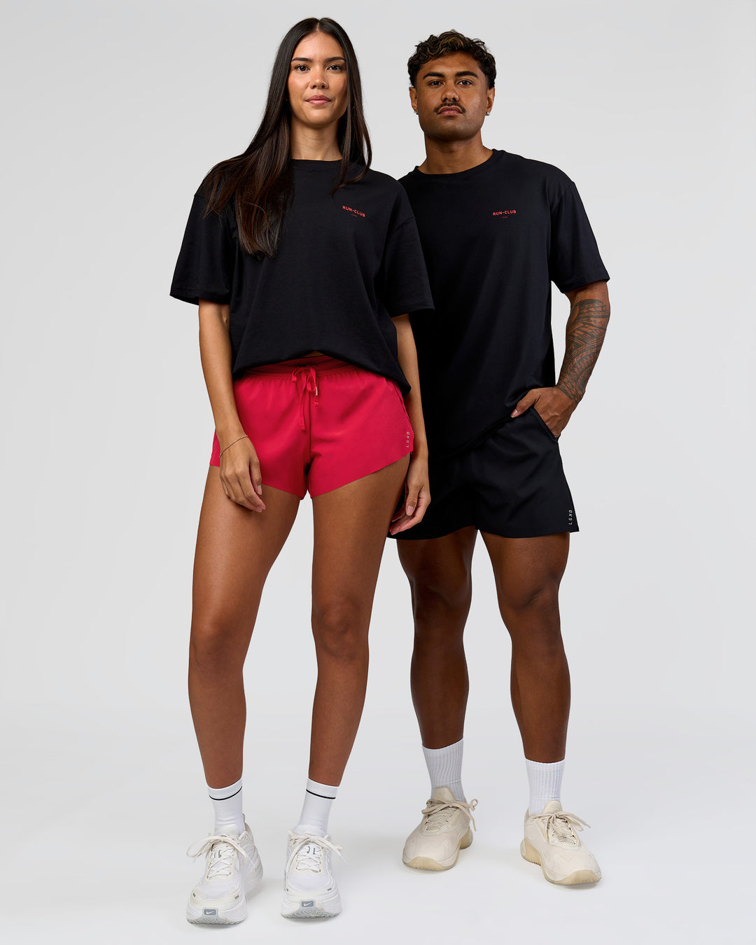 Duo wearing RUN CLUB FLXCotton Tee Oversize - Black-Scarlet | Model:Xav | Size:L | Model:Rhiley | Size:XS - view 9