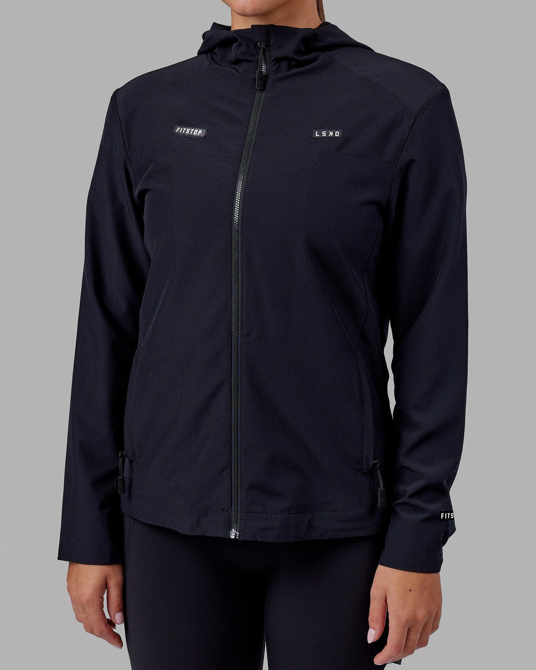 Woman wearing Fitstop Womens Functional Training Jacket - Black - view 1