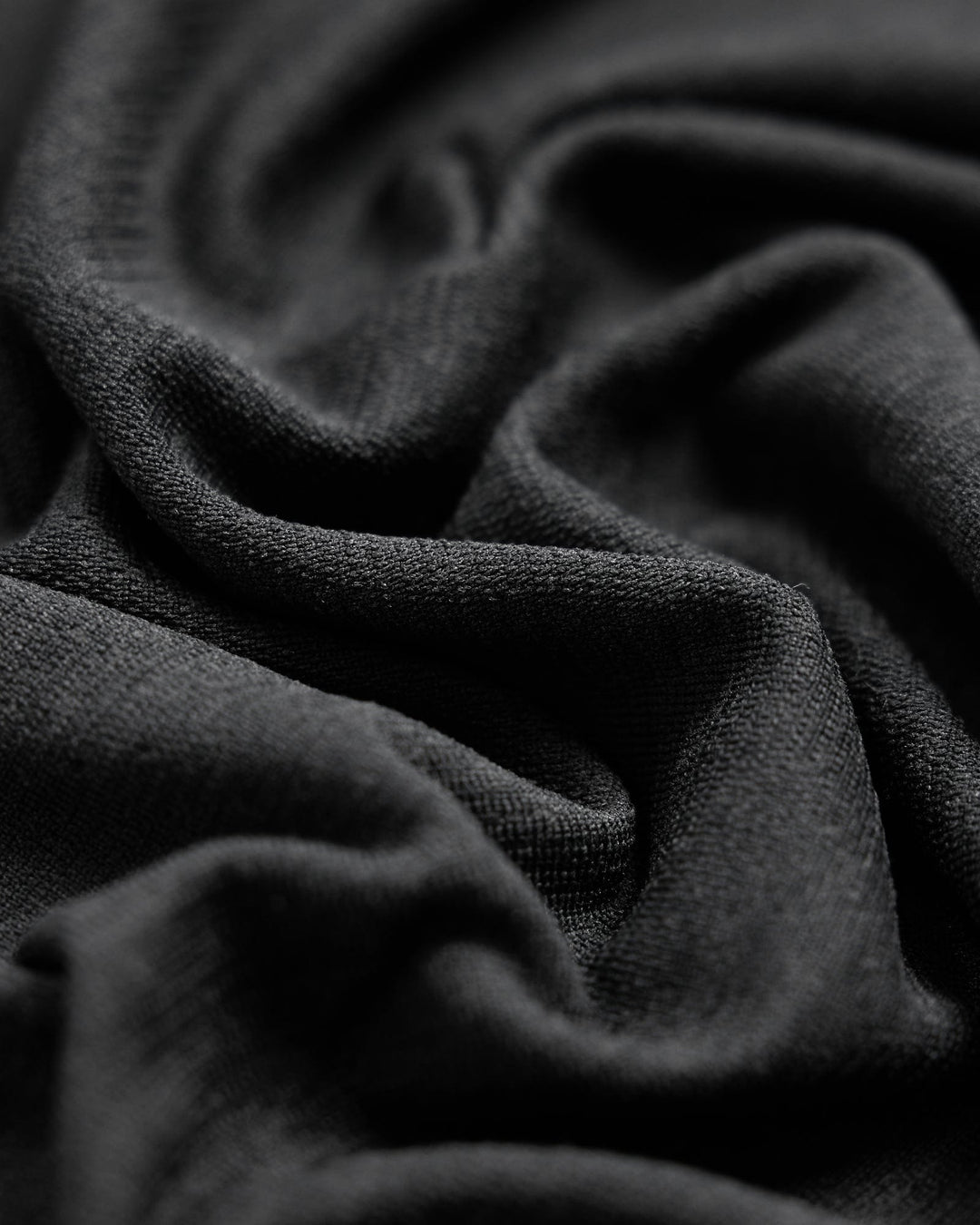 Woman wearing AeroFLX+ Seamless Tank - Black Marl - view 7
