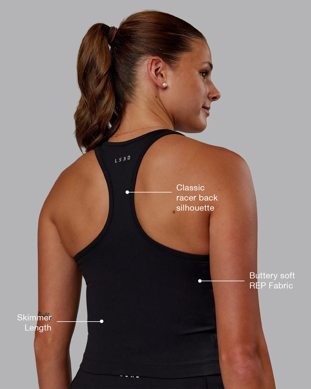 Woman wearing Flow Performance Tank - Black | Model:Phoebe | Size:S - view 2