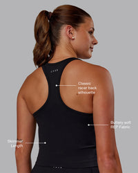 Woman wearing Flow Performance Tank - Black | Model:Phoebe | Size:S | Thumbnail Index: 1