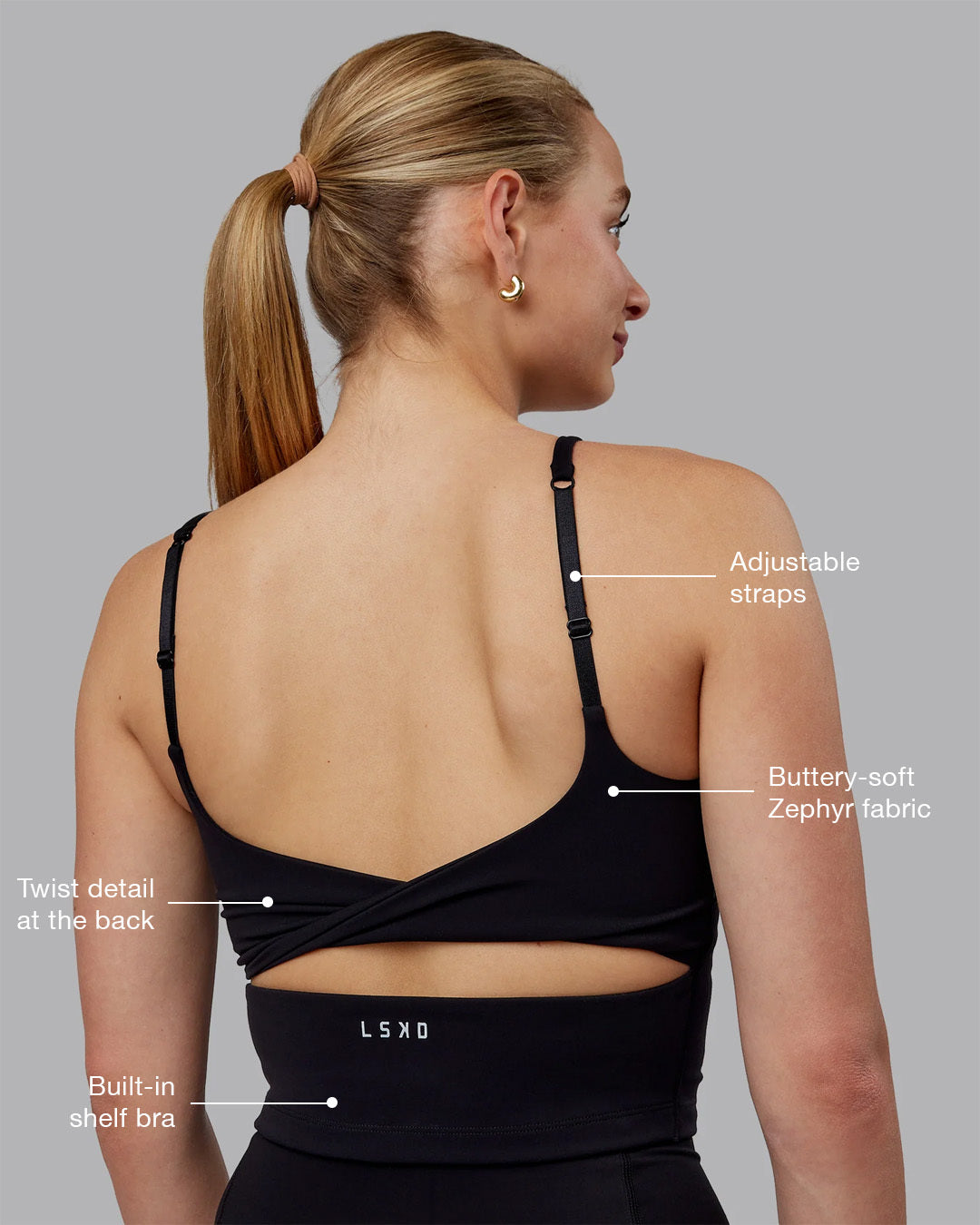 Woman wearing Twist Shelf Bra Tank - Black - view 2