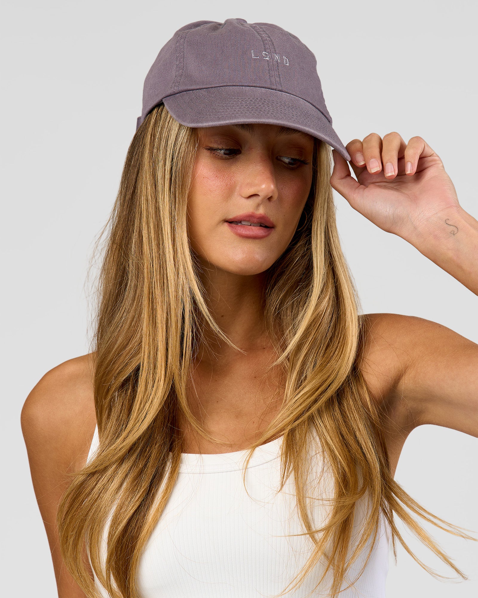 Female wearing All Day Cap in Duskstone