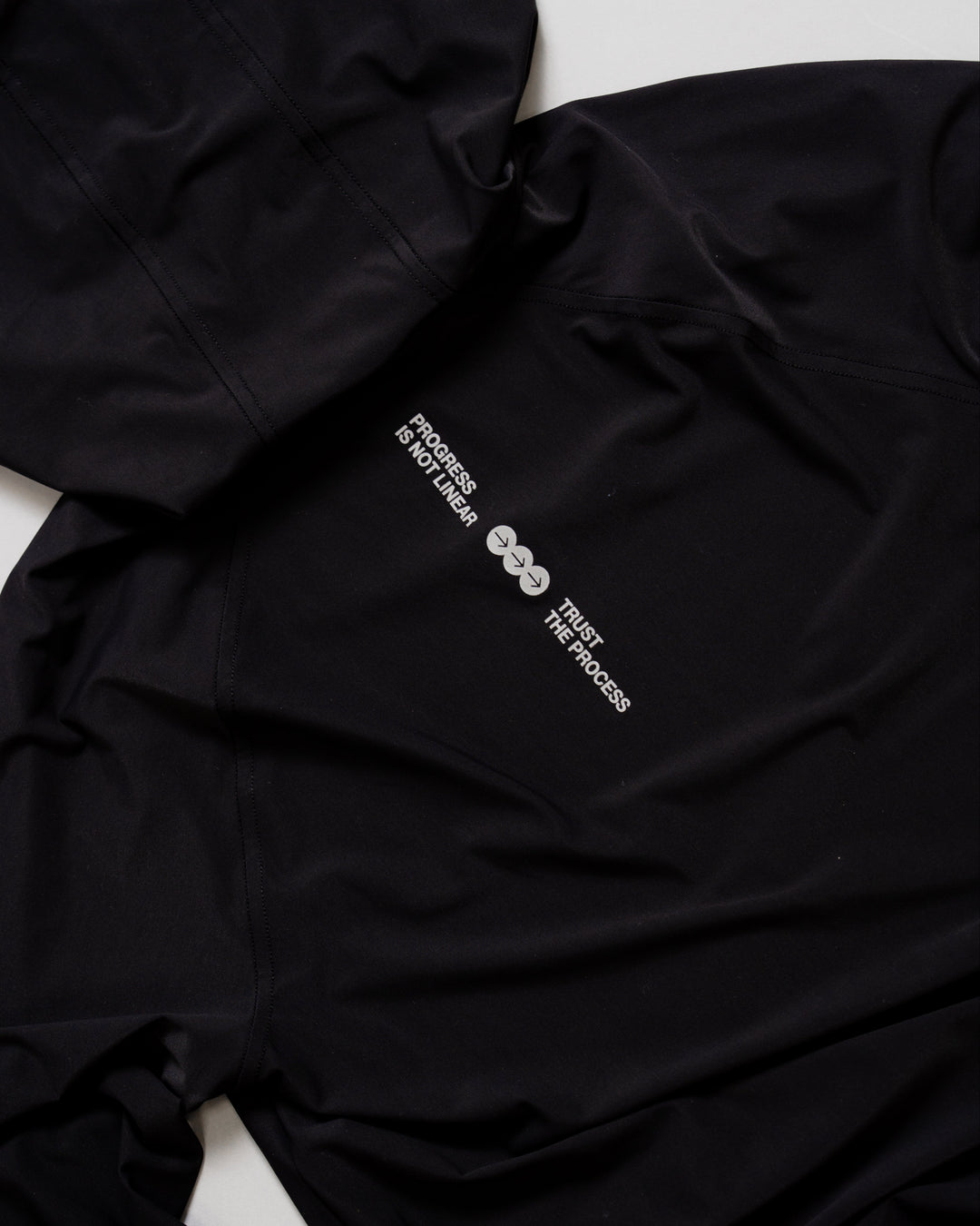 Flatlay of On the Run Long Sleeve in Black back panel with reflective details - view 3