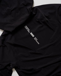 Flatlay of On the Run Long Sleeve in Black back panel with reflective details | Thumbnail Index: 2