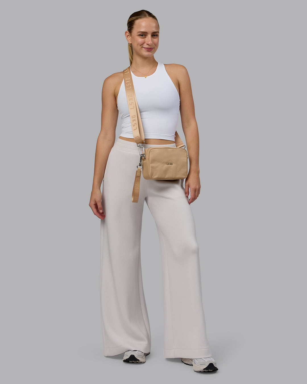 Woman wearing Go-To Shoulder Bag - Oat Milk - view 9